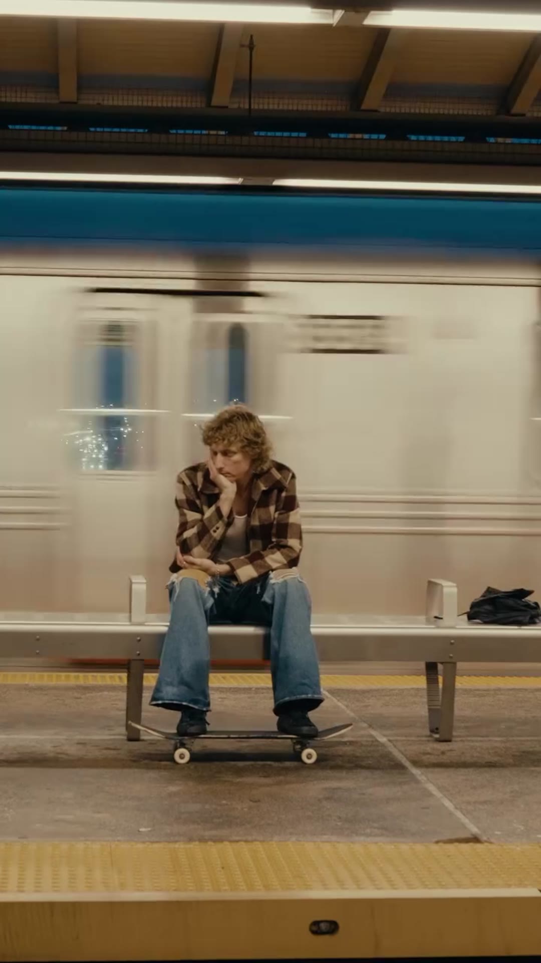 Shane Boyer skating a New York City subway platform